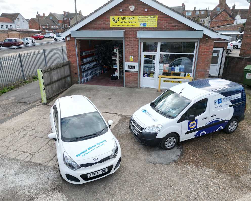 Spilsby shop exterior and vans